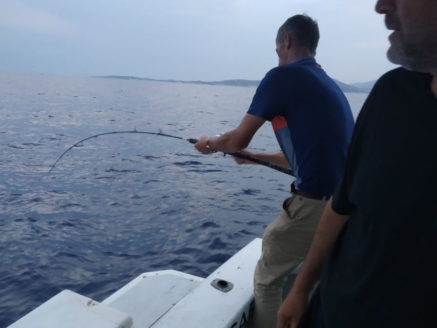 Athens: Fishing Trip Experience on a Boat with Seafood Meal - Swimming, music, and an unhurried afternoon