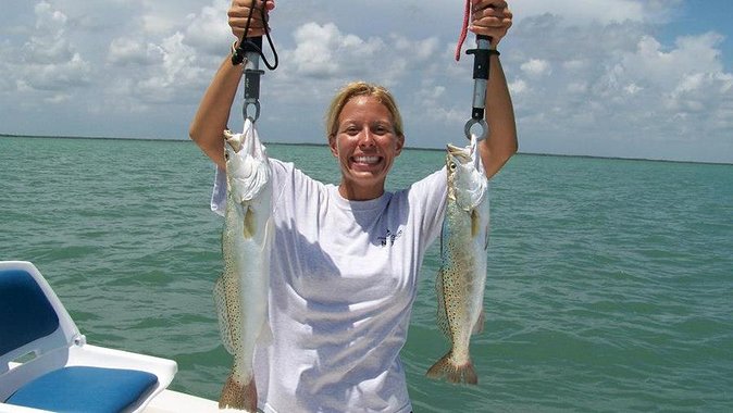 Biscayne Bay Night Fishing Charters - Passing Miami’s waterfront parks and arena