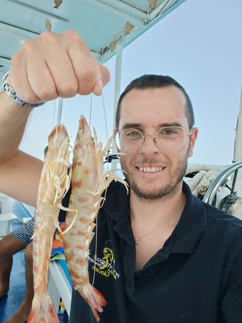 Cefalù: boat trip with fishing, coastal tour, snorkeling, and lunch on board - Watching the nets come in after 9 am