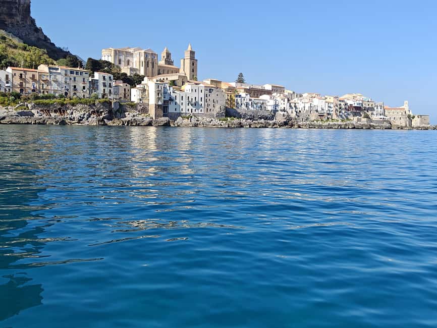 Cefalù: boat trip with fishing, coastal tour, snorkeling, and lunch on board - A seafood lunch cooked beside the catch