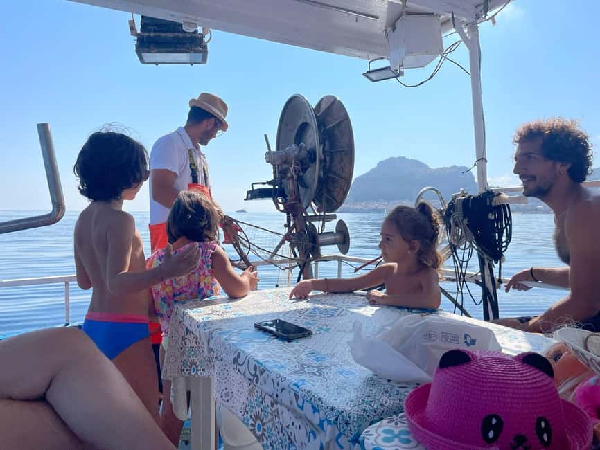 Cefalù: boat trip with fishing, coastal tour, snorkeling, and lunch on board - What the boat is like for six hours