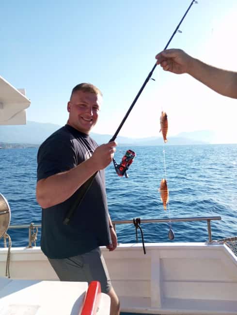 Chania: Fishing Boat Trip with Breakfast and Swim - A short swim in the clear water