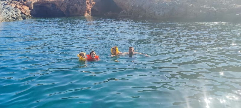 Crete: Boat Cruise with Fishing, Swimming, Lunch, and Drinks - Seafood lunch on board