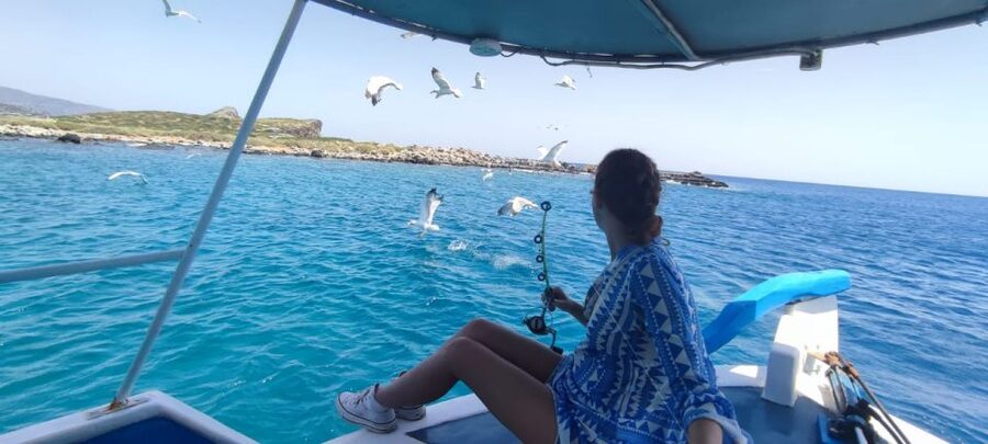 Crete: Fishing & Swimming Boat Cruise with Lunch & Drinks - Learning to fish with a local crew