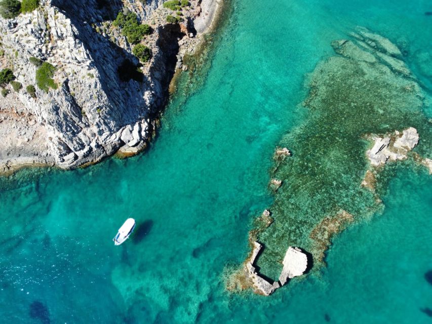 Crete: Fishing & Swimming Boat Cruise with Lunch & Drinks - Swimming and snorkeling in a quiet bay