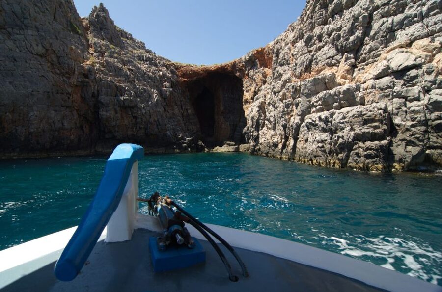 Crete: Fishing & Swimming Boat Cruise with Lunch & Drinks - Eating fish caught that day