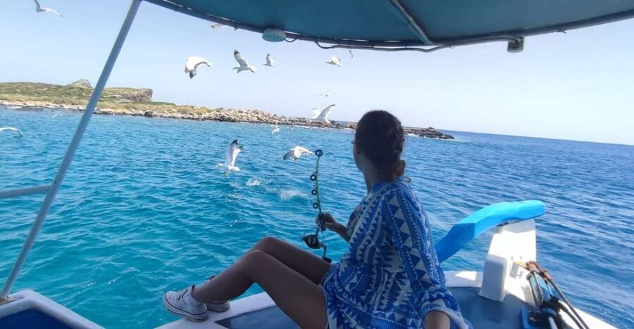 Crete: Fishing & Swimming Boat Cruise with Lunch & Drinks - Setting out across Elounda Bay