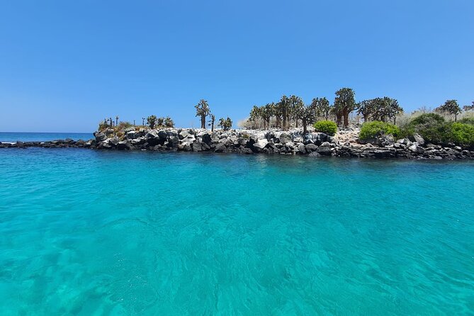 Day Tour to Santa Fe Island and Hidden Beach with snorkeling and fishing - Santa Fe Island after a 45-minute crossing