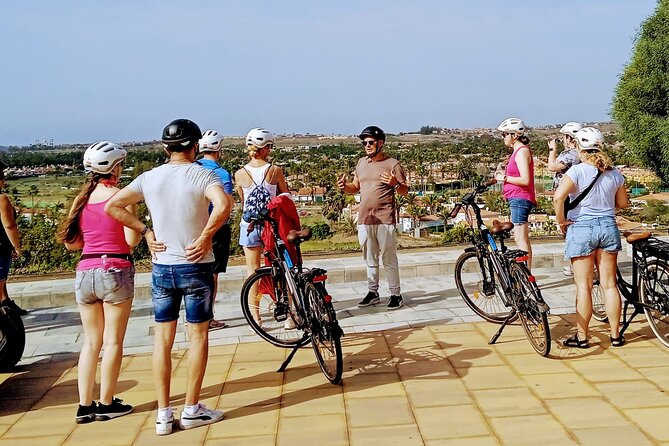 Electric Bike Panoramic South Coast Tour Optional Fishing Tapas - Meloneras, volcanic shore, and the lighthouse
