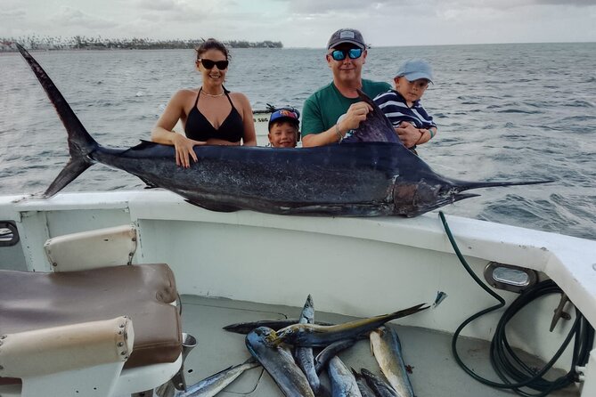 Fishing Adventure Punta Cana – Full Experience Professional - Boarding with rods, reels, bait, and a little room to relax
