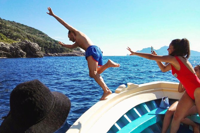 Fishing Experience Around Capri from Sorrento with Lunch Onboard - Swimming and snorkeling in clear water