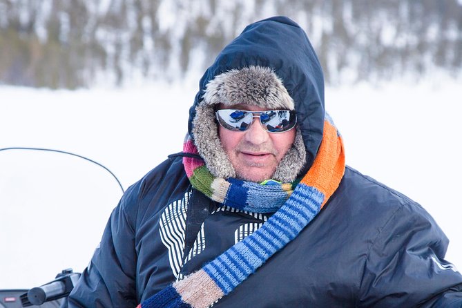 From Ivalo: Ice Fishing Safari to Lake Inari, reindeers & lunch - Reindeer on an island and a Finnish outdoor lunch