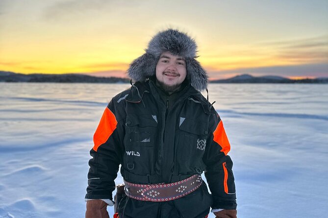 From Saariselkä: Ice Fishing Tour to Lake Inari, reindeers &lunch - The snowmobile sled ride across frozen Lake Inari