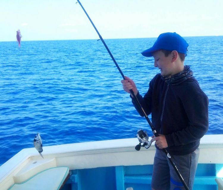 From Sorrento: Fishing in Capri with Lunch - Cruising the island and the swim stop