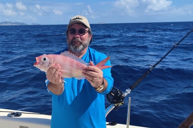 Full-Day Deep Sea Fishing Adventure in Sint Maarten - Keeping your catch