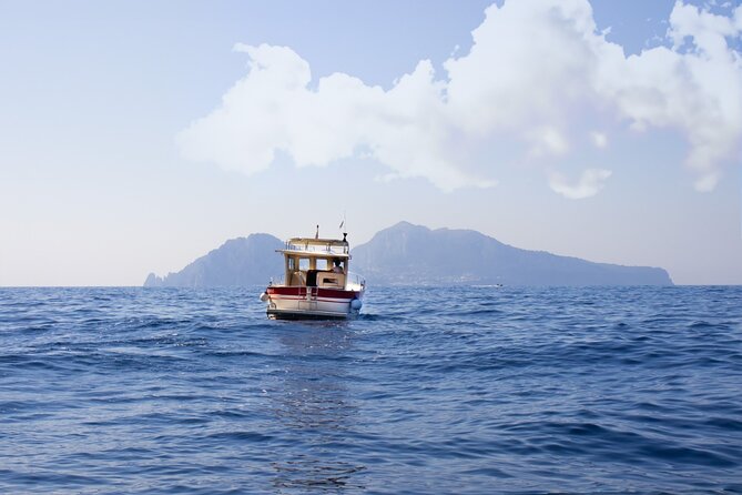 Group Capri tour , visit of caves, fishing legend and swimming - A full day on the water from Sorrento