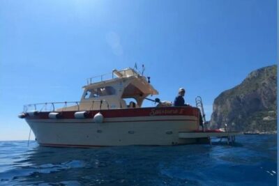 Group Capri tour , visit of caves, fishing legend and swimming