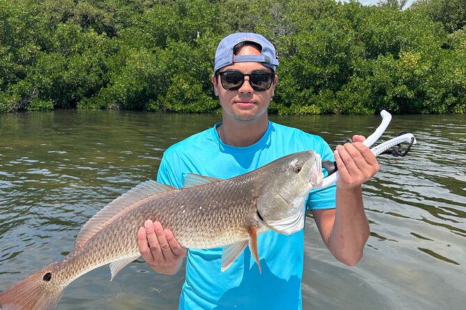 Half day fishing Charter in St. Petersburg Florida - Handling the catch after returning