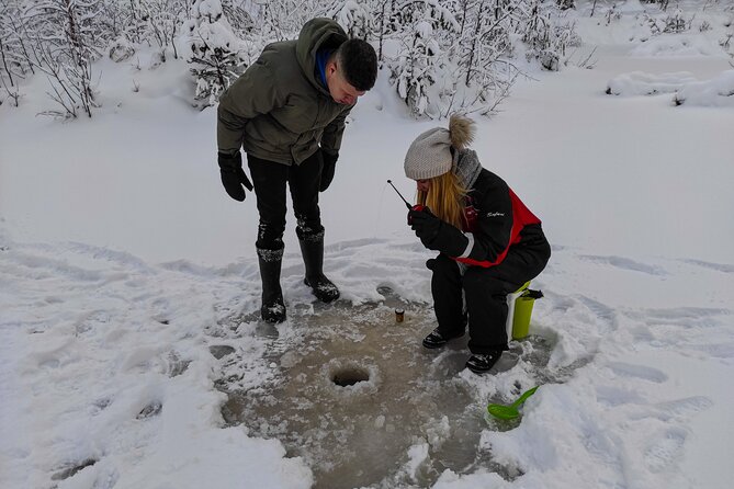 Half-Day Husky Safari and Salmon Ice Fishing Experience - Learning to handle a husky sled