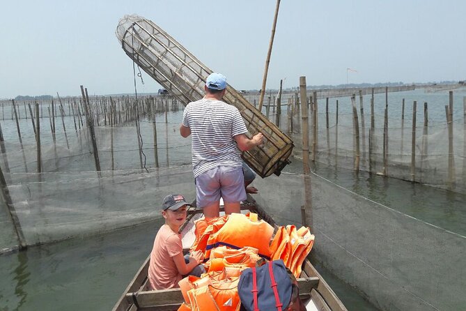 Hue Motorcycle Tour with Fishing: Best Unique Day Trips in Hue - Thuy Xuan turns a craft village into a colorful stop