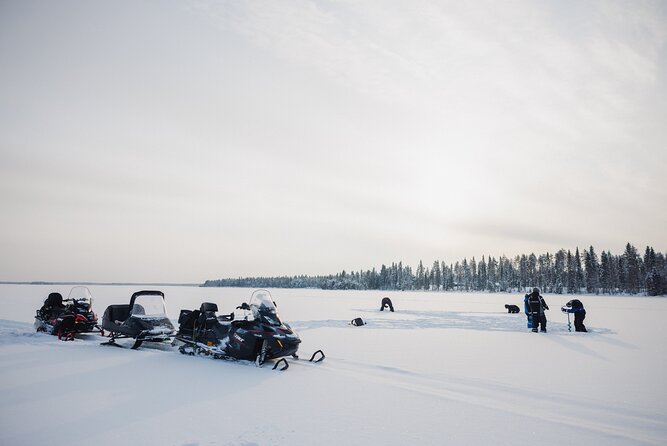 Ice Fishing and Snowmobile Safari Combo in Lapland - From Rovaniemi streets to a frozen lake
