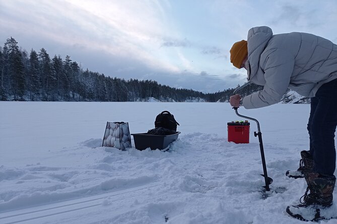 Ice fishing experience with Backpacker Helsinki Tour - Learning the rhythm of Finnish ice fishing