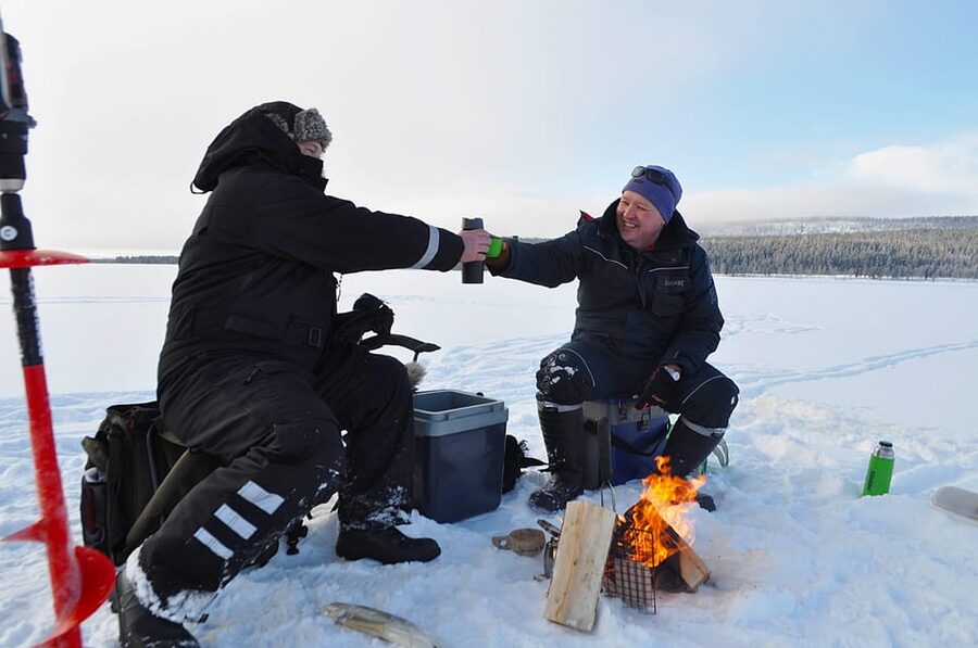 Ice fishing program in Lapland - From Arctic City Hotel to a Frozen Lake