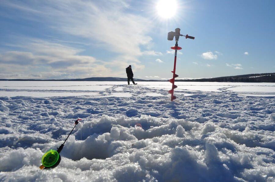 Ice fishing program in Lapland - Learning the Local Way to Fish Through Ice