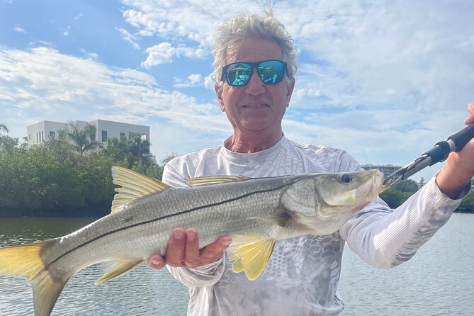 Inshore Fishing by Charter in Sarasota - Keeping watch for dolphins and manatees