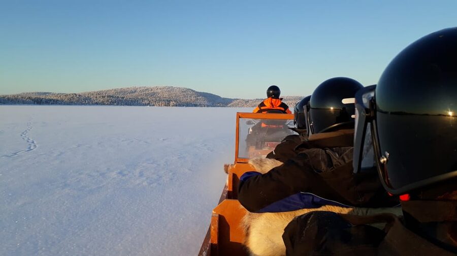 Ivalo: Ice Fishing Tour to Lake Inari, Reindeers & Lunch - From Ivalo to Koppelo by warm winter gear