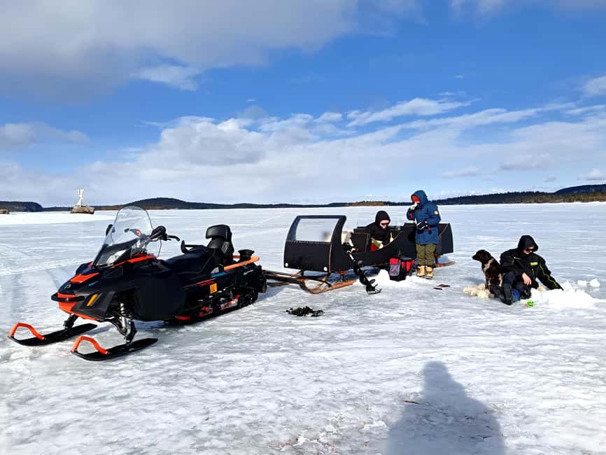 Ivalo: Ice Fishing trip to Lake Inari - Reaching Lake Inari by snowmobile-pulled sleigh