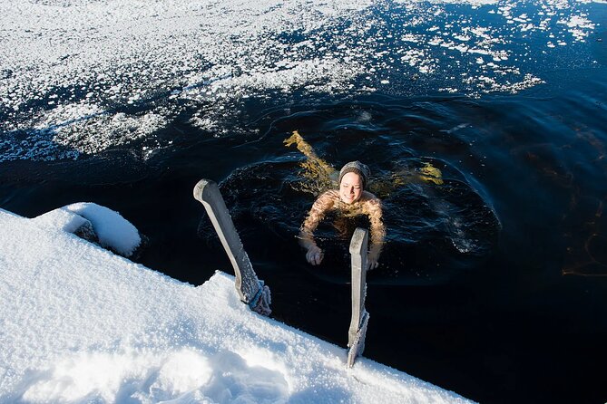 Lakeside Sauna Trip with Ice Fishing and Ice Swimming - A campfire lunch with Lappish flavors