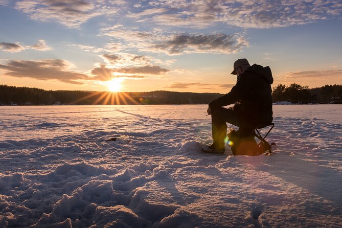 Lapland Ice Fishing Experience from Rovaniemi - Drilling your own hole in the frozen lake
