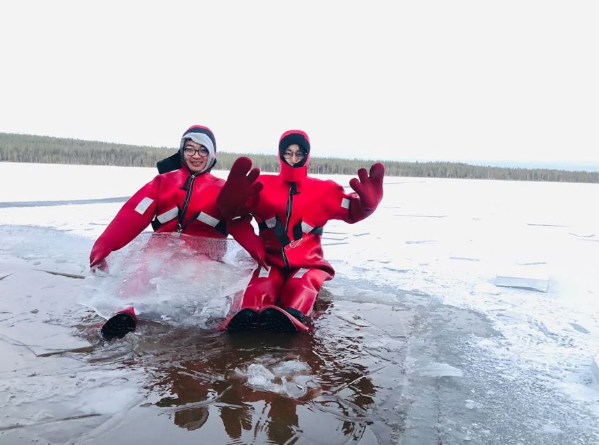 Lapland: Ice Fishing, Floating & BBQ Snow Adventure - Floating in a Frozen Lake
