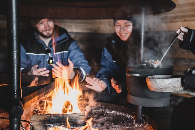 Lappish Lunch Break -Snowmobiling, ice fishing and tasty food - Learning the Finnish way to fish through ice