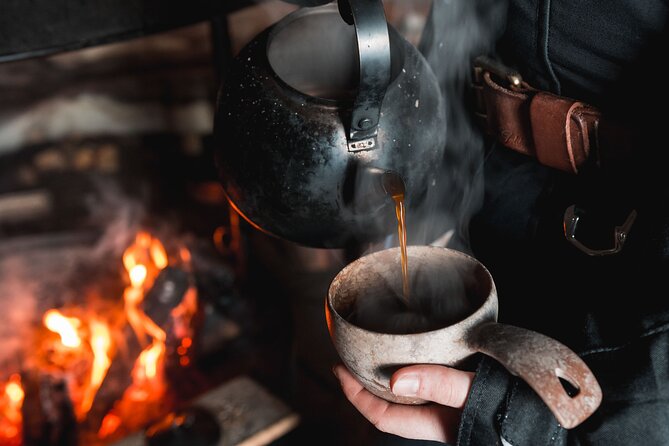 Lappish Lunch Break -Snowmobiling, ice fishing and tasty food - Who will enjoy this Rovaniemi tour most