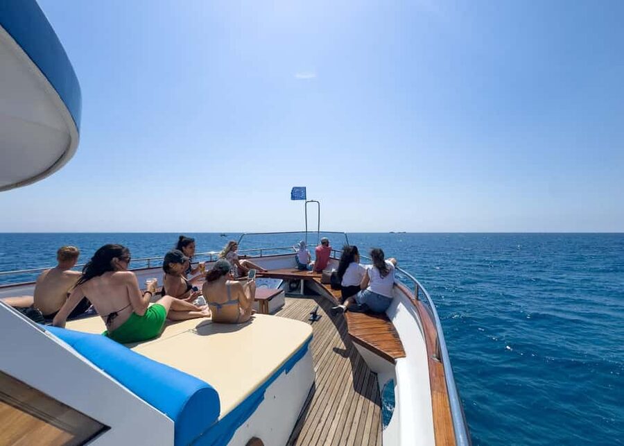 Larnaca: Relaxing Cruise with Fishing and BBQ Lunch - Swimming stops and the airport flyover