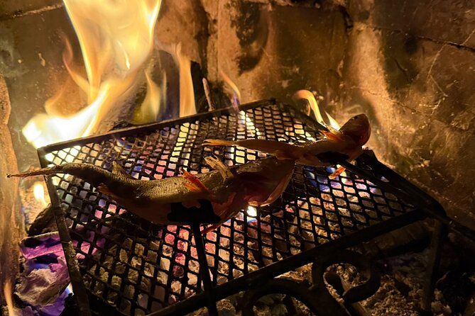 Levi Ice Fishing Experience in the Wild with Campfire Treats - Fishing on a frozen lake near the cabin