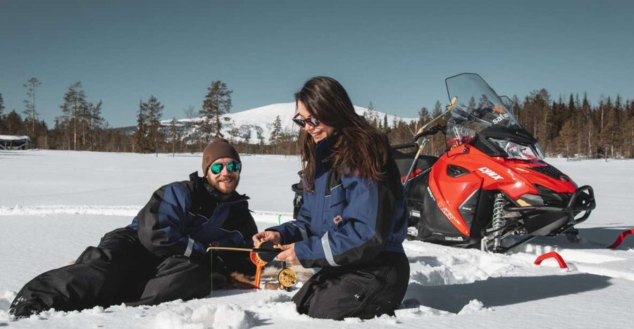 Levi: Snowmobile Safari with Ice Fishing and Outdoor Lunch - Soup, hot drinks, and a fire in the snow