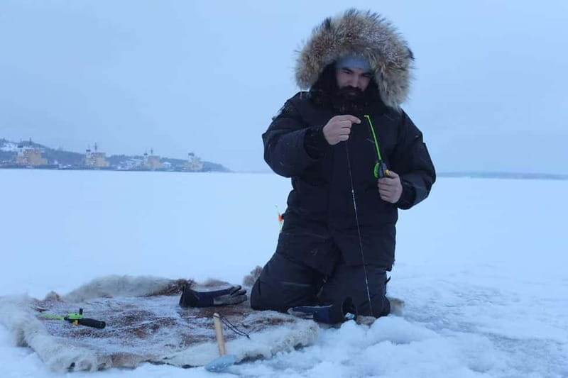 Lulea: Ice Fishing Tour in the heart of the city with Guide - Clothing, comfort, and cold-weather planning