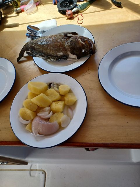 Naxos: Private Fishing Trip with Catch & Cook Onboard Meal - Eating beside Ano Koufonisia