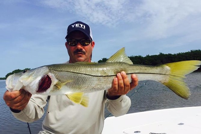 Orlando Inshore Fishing Charters - Port Canaveral gives the trip more than a fishing backdrop