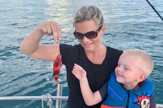 Private Fishing Charter for Family and Friends in Honolulu - Reef fishing with lines in the water quickly