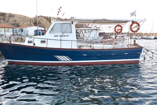 Private Fishing Trip in a Traditional Boat from Athens - Working the lines with a Greek fisherman