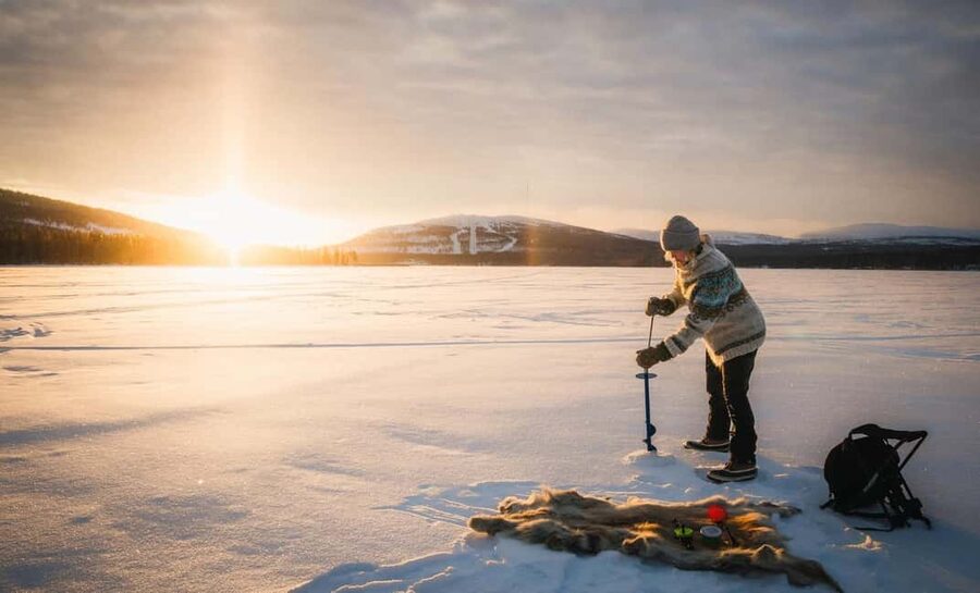 Pyhä: Ice Fishing Experience at Frozen Lake - Finnish meditation beside a frozen lake
