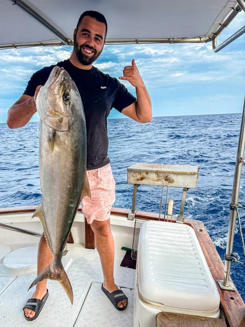 Rhodes: Captain Manolis Fishing Trip with BBQ and Swimming - Views of Rhodes from the water