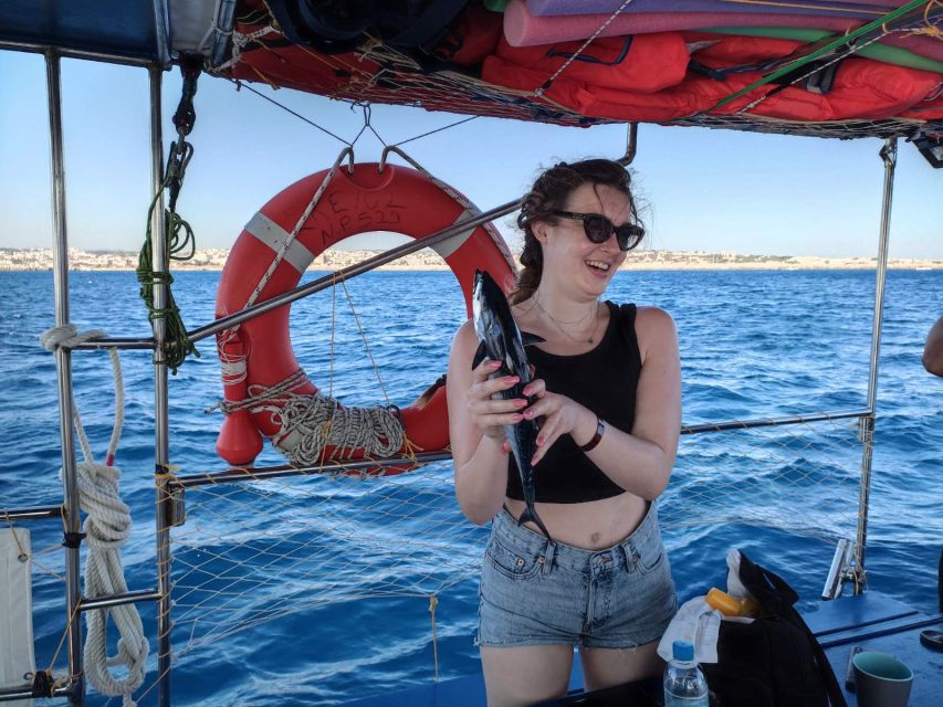 Rhodes: Fishing Trip, Snorkelling, BBQ, & Professional Guide - Practical value at $88 per person