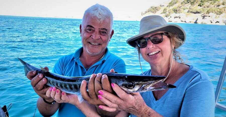 Rhodes: Fishing Trip, Snorkelling, BBQ, & Professional Guide - Ground fishing for about two hours