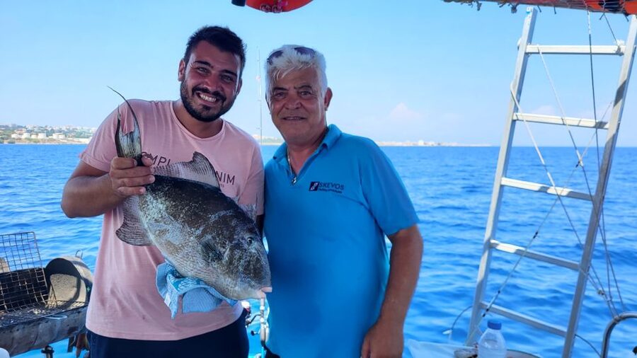 Rhodes: Fishing Trip, Snorkelling, BBQ, & Professional Guide - Trolling along the Rhodes coast