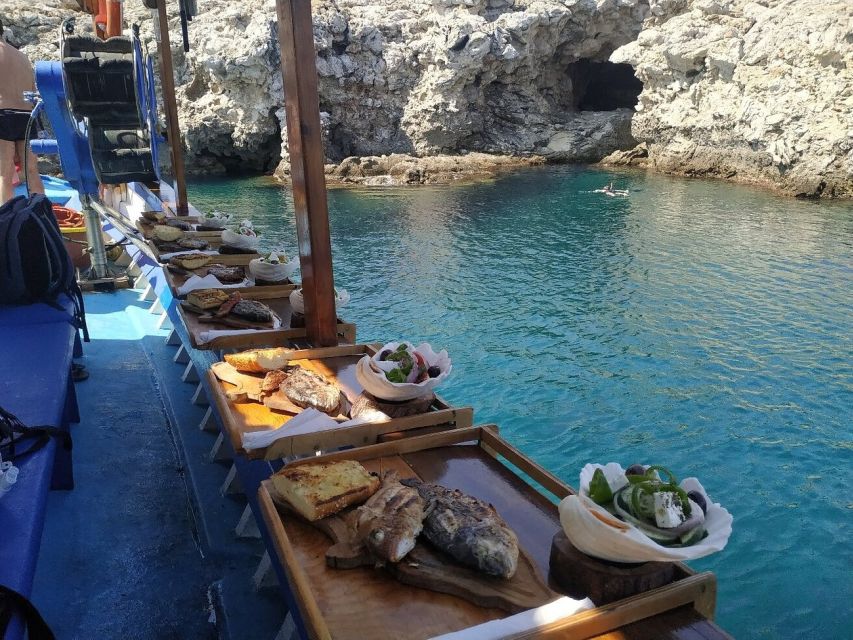 Rhodes Town: Fishing Boat Trip with Fish Meal and Swim Stops - The barbecue lunch is the trip’s big reward